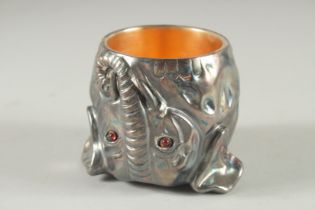 A RUSSIAN SILVER ELEPHANT CUP. 2.5ins high, 2.25ins diameter. Marks on the rim.