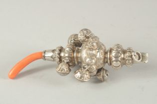 A VICTORIAN SILVER AND CORAL BABIES RATTLE.