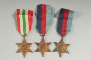 THREE UNNAMED 1939 - 1945 STARS.