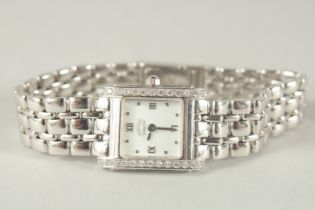 A LADIES 18CT WHITE GOLD AND DIAMOND RIALTO WRIST WATCH.