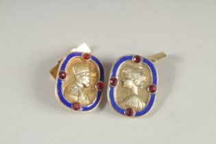 A PAIR OF RUSSIAN SILVER AND BLUE ENAMEL CUFF LINKS.