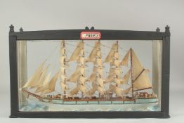 A GLASS CASED SAILING VESSEL "FRANCE". 17ins long.