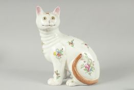 A GOOD EARLY GALLE OF NANCY POTTERY CAT. Signed, with flowers and glass eyes. 11ins high.