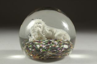 A PAPERWEIGHT with a sulphur lion.