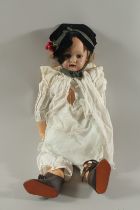 A SIMON AND HALBIG DOLL S & H 1079, 13 D E P. with bisque head and articulated body. 27ins long.