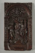 A VERY GOOD ARCHED CARVED OAK PANEL "DEDO PECURIS". 17ins x 10ins.