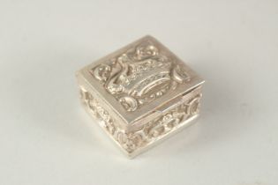 A SQUARE SILVER STAMP BOX.