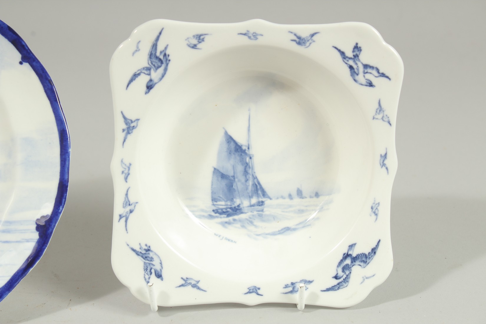A ROYAL CROWN DERBY SQUARE SHAPED BOWL painted with sailing vessels by W.E.J.DEAN. Signed and a - Image 3 of 6