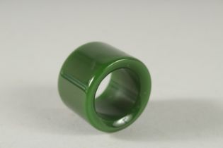 A JAPANESE ARCHER'S RING. 1.25ins diameter.