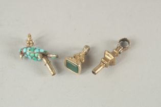 THREE VARIOUS WATCH KEYS.