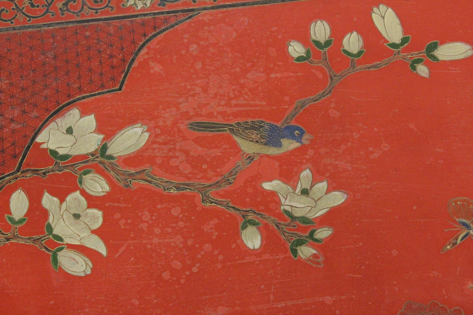 A CHINESE RED LACQUER AND CHINOISERIE DECORATED RECTANGULAR LOW TABLE decorated with flowers, - Image 3 of 4