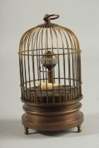 A DECORATIVE BIRD CLOCK in a case 5ins high.