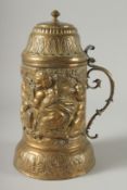 A LARGE 18TH - 19TH CENTURY CONTINENTAL FLAGON with cupids in relief. 13ins high.