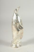 A SILVER PLATED PENGUIN SUGAR SIFTER. 7ins high.