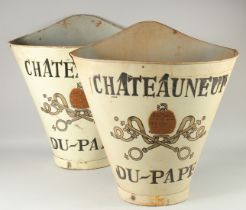 A PAIR OF CREAM CHATEAU NEUF DU PAPE GRAPE CARRIERS. 24ins high.