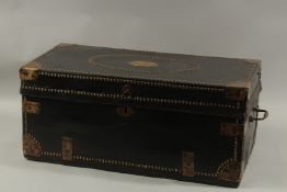 A HISTORICAL EARLY 19TH CENTURY LEATHER CLAD CAMPHOR WOOD BRASS STUDDED CHEST with brass angels