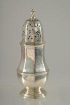 A RARE SMALL GEORGE I SILVER OCTAGONAL PEPPER CASTER. 4.5ins high. London 1725. Maker: Thomas