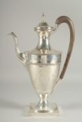 A SUPERB GEORGE III SILVER COFFEE POT by Hester Bateman, urn shape, beaded edge on square base.
