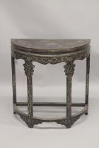 A CHINESE BLACK LACQUER AND GILT DECORATED DEMI-LUNE CONSOLE TABLE decorated with a river and