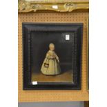 Portrait of a young girl wearing a white dress, colour print, in a ripple moulded frame.