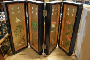 A Chinese miniature folding double sided screen decorated with hard stones etc.