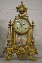 An ormolu mantle clock.