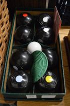 A boxed set of carpet bowls.