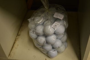 Fifty Bridgestone golf balls.