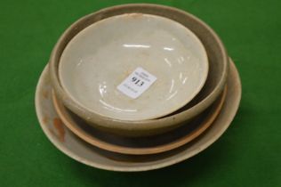 A small group of earthenware bowls.