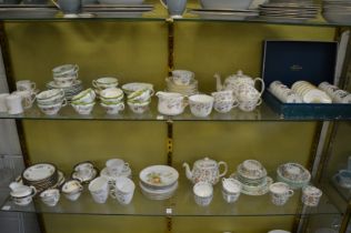 A large quantity of part tea services by Minton and other makes together with a Royal Worcester