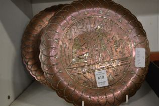 A pair of Egyptian inlaid copper dishes.