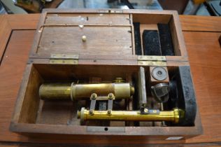 A Leitz Wetzlar mahogany cased brass microscope.