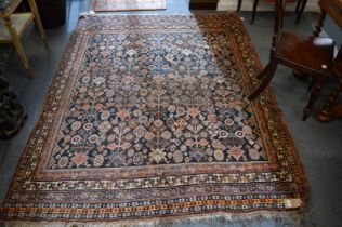 A good Persian carpet, dark blue ground with all-over stylised floral decoration 210cm x 165cm.