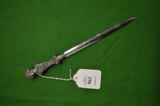 A letter opener with Art Nouveau style handle.