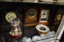 Various clocks and a barometer.
