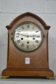 An Edwardian brass inlaid mahogany mantle clock, the dial signed Bravington, Kings Cross & Ludgate