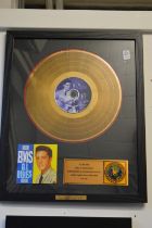 Elvis Presley limited edition collectors series gold disc, framed and glazed.