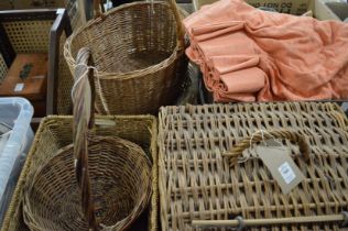 A quantity of baskets, curtains etc.