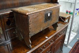 An 18th century and later small oak coffer.