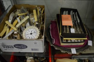 A quantity of plated flatware and other items.