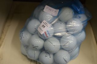 Fifty Gallaway golf balls.