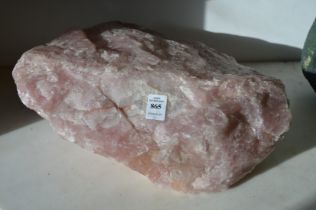 A large piece of rose quartz approx 36cm wide.