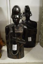 A pair of carved African hardwood busts.