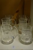Six Commemorative glass tankards.