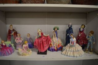 A group of Royal Doulton and other figurines.