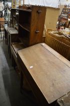A pine clerks desk, oak bookshelf and a pine table.