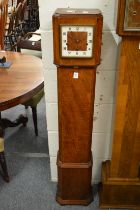 A 1930's walnut grandmother clock.