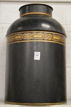 A large reproduction Toleware tea canister and cover.