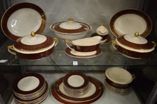 Gilt decorated dinner service.