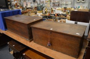 A small oak blanket box and a similar pine box.